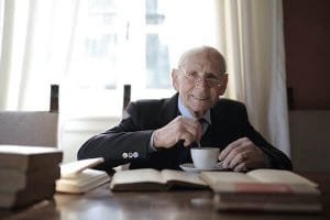 Elderly man smiling for virtual memorial website