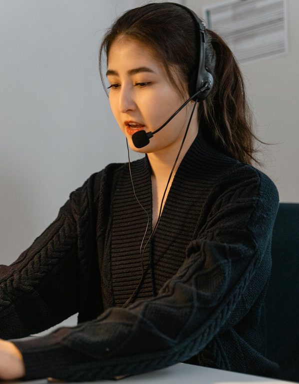 Woman talking during recorded virtual funeral service.
