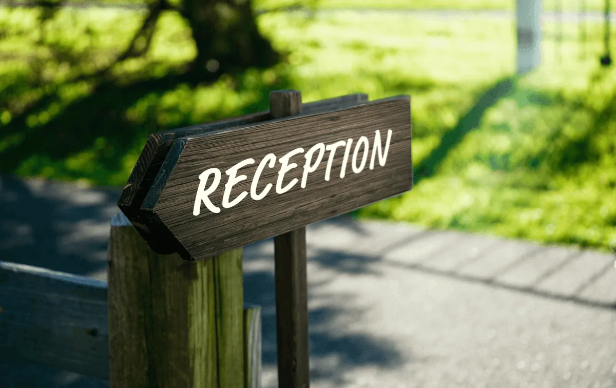 Sign point to Memorial Reception